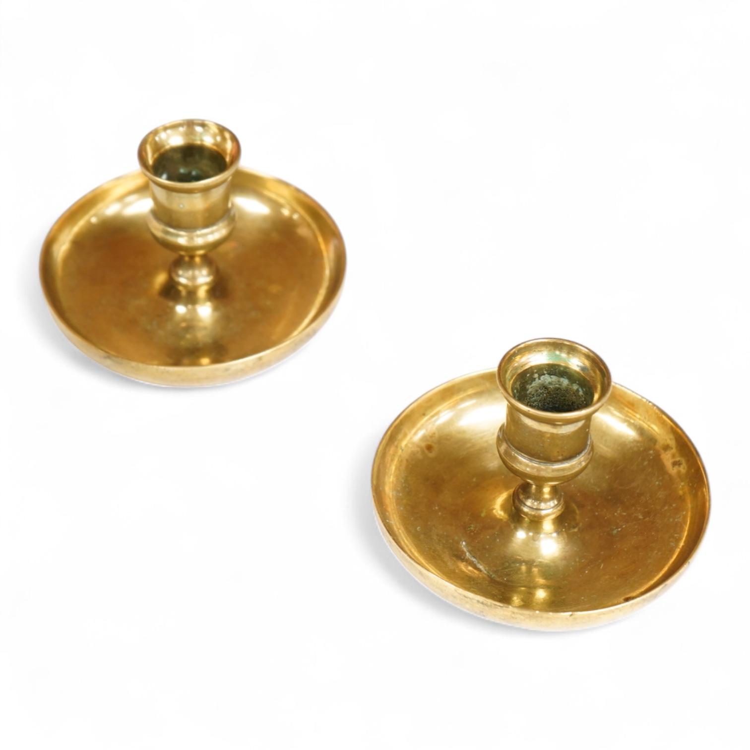 A pair of early 19th century brass ‘Brighton bun’ travelling candlesticks, 7cm high